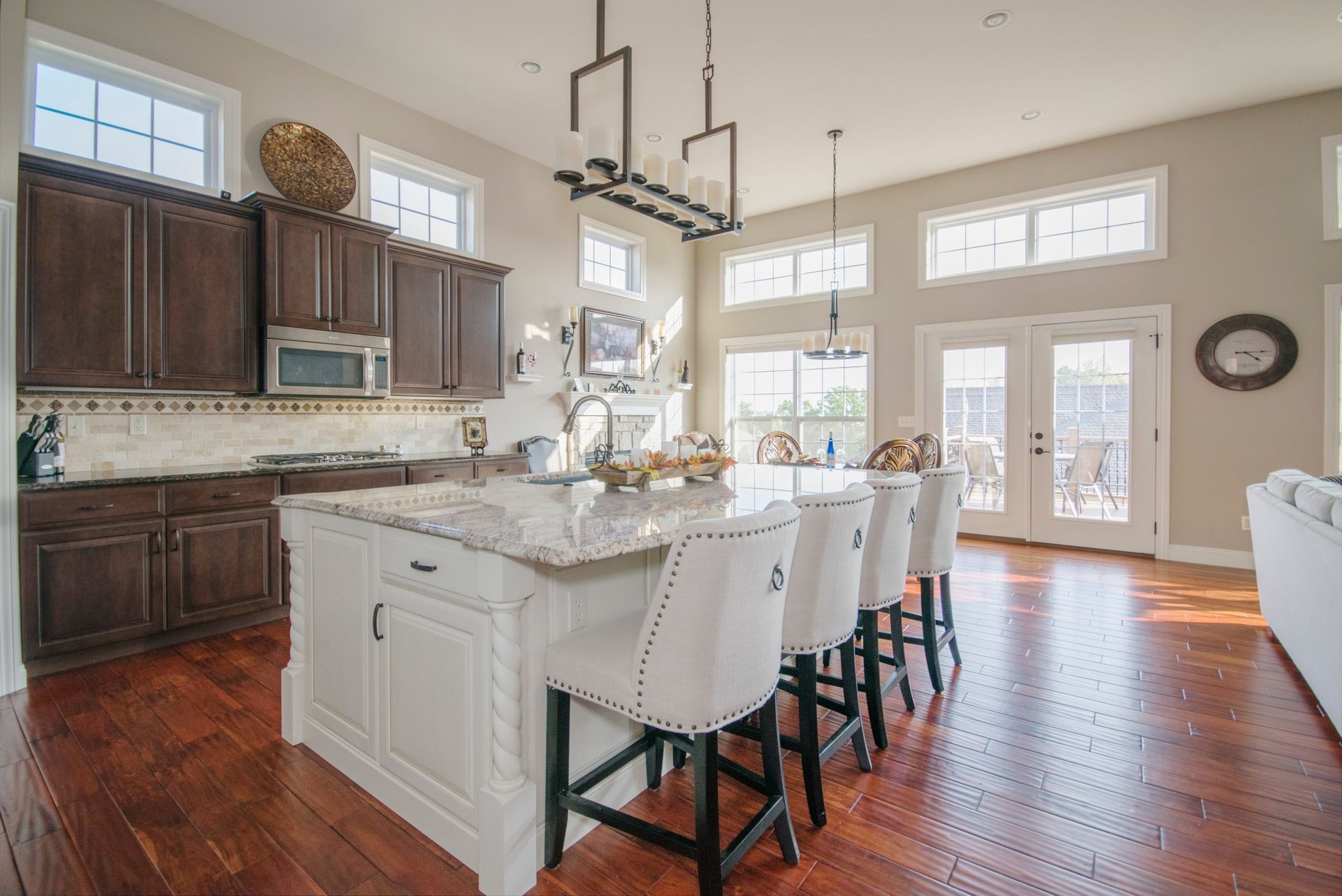 There is a large island in the middle of the kitchen.